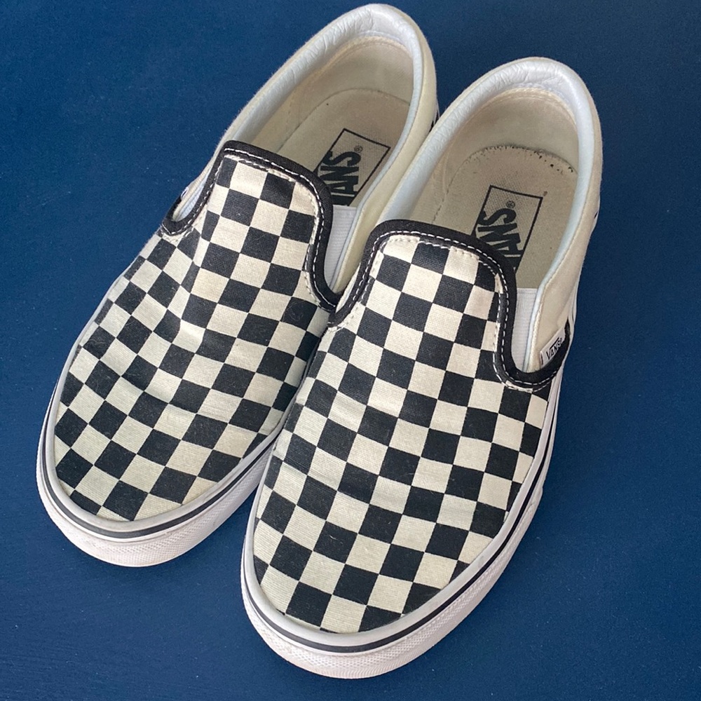 Vans black and white checkered slip ons